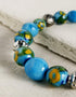 Handmade Round Bracelet With Blue Pottery Beads & Metal Beads  - Colour Turquoise & Yellow